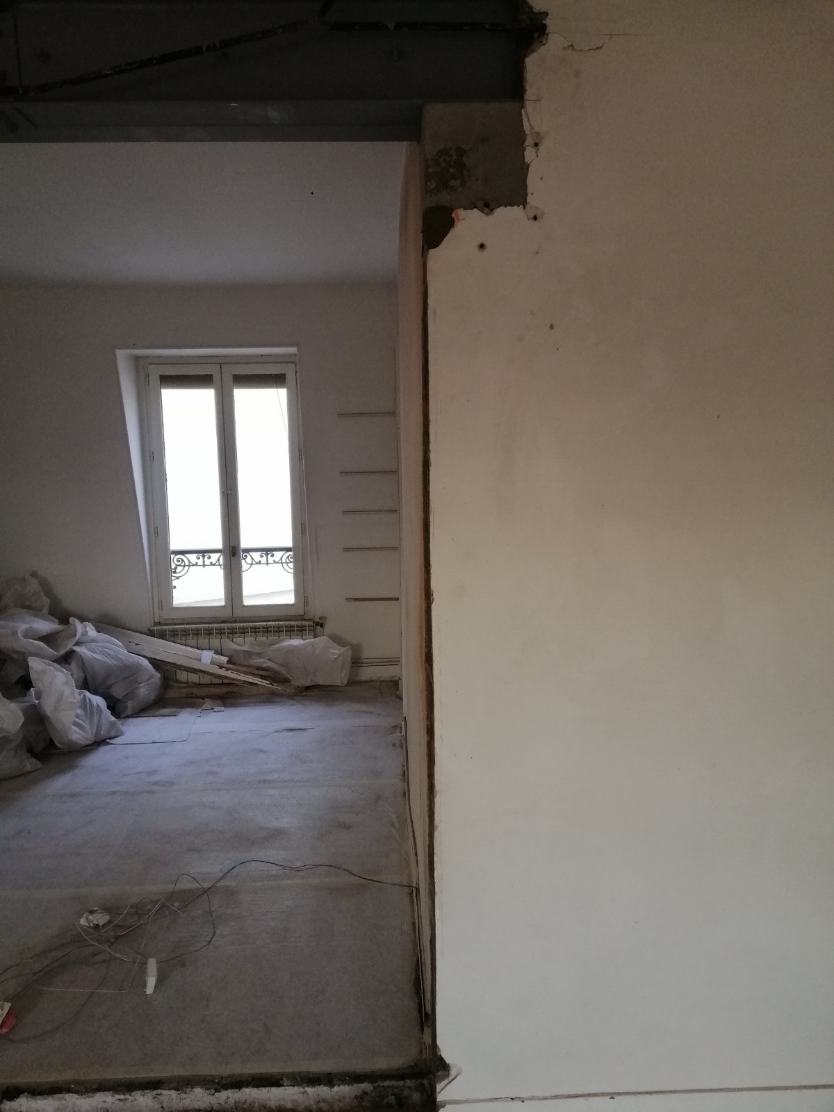 Création d'une ouverture dans un mur porteur à Paris 18ème - Agrandissement d'une baie