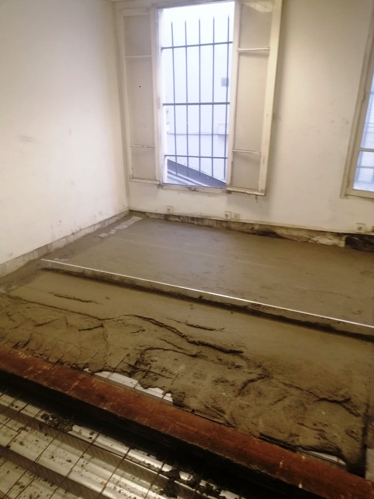 Création d’un plancher collaborant RDC à Paris 16ème. - Renforcement des poutres