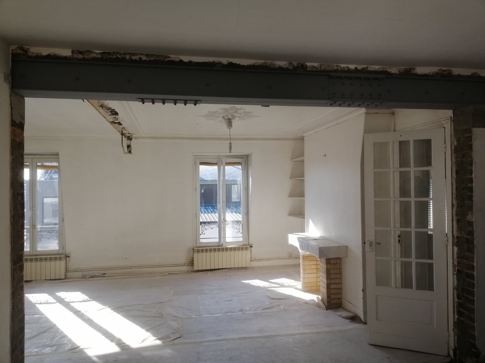 Création d'une ouverture dans un mur porteur à Paris 18ème - Agrandissement d'une baie