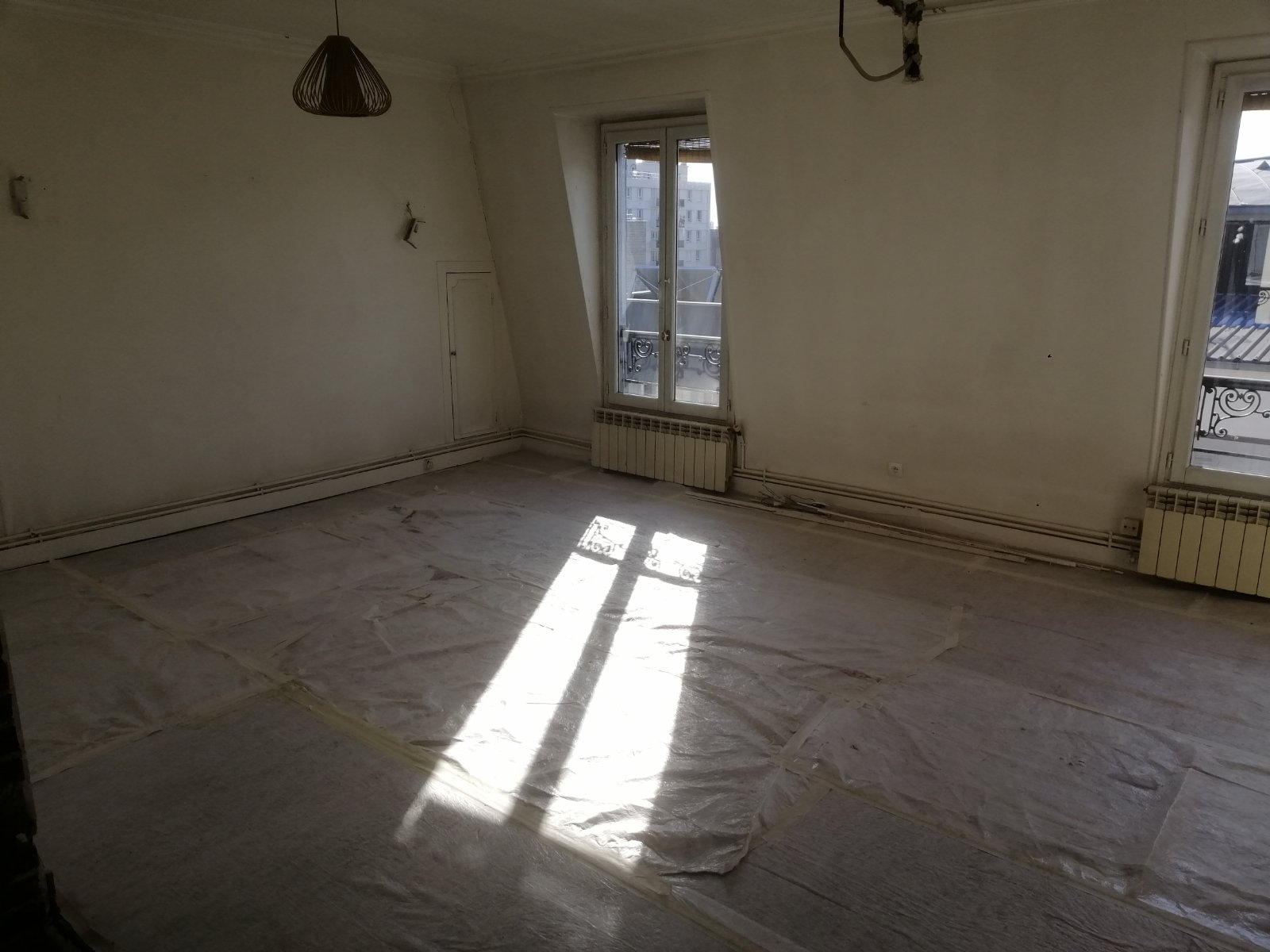 Création d'une ouverture dans un mur porteur à Paris 18ème - Agrandissement d'une baie